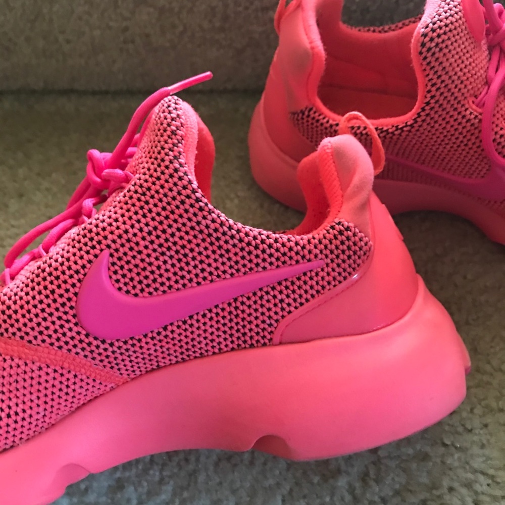 Neon pink Nikes